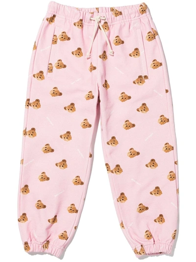Palm Angels All-over Teddy Bear Print Trousers In Pink
