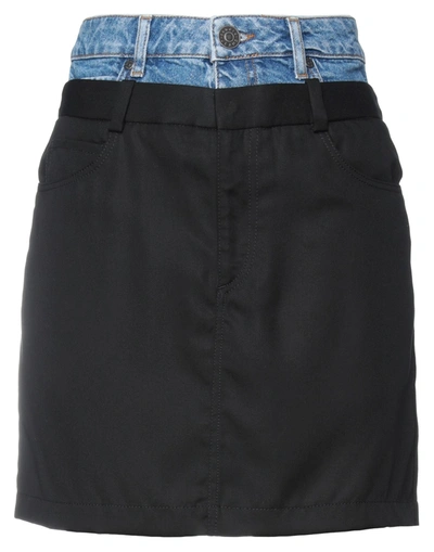 Sandro Mini Skirts In Black