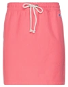 Champion Mini Skirts In Coral