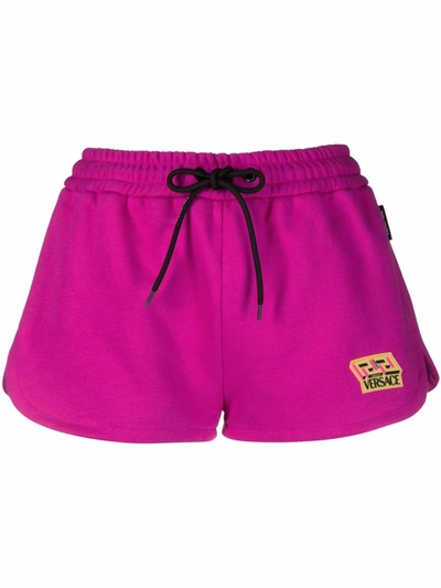 Versace Elastic Waist Mini Shorts With Greek Logo Patch In Pink