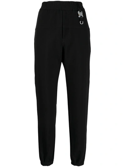 Alyx Tapered Buckle Detail Trousers In Schwarz