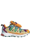 Adidas Originals X Sean Wotherspoon Superturf Adventure "jiminy Cricket" Sneakers In Mesa, Halo Amber & Glory Purple