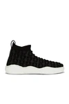 Alaïa Petal Sneakers In Noir