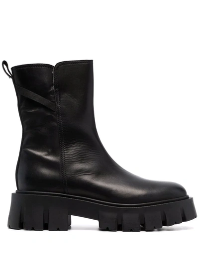 Premiata Leather Shearling Boots In Black