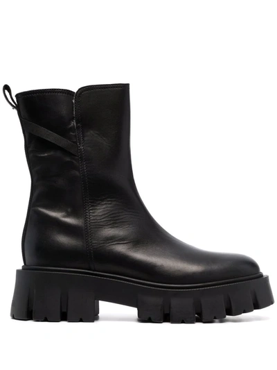 Premiata Leather Shearling Boots In Schwarz