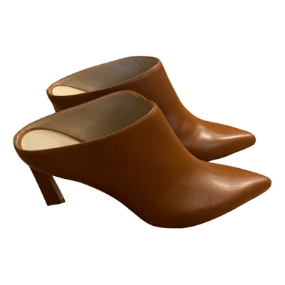 Pre-owned Stuart Weitzman Leather Mules In Camel