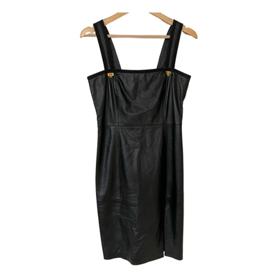 Pre-owned Ferragamo Leather Mid-length Dress In Black