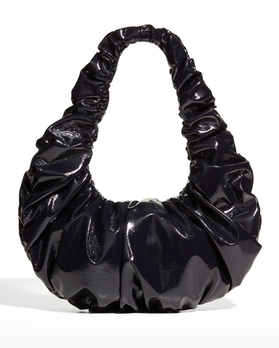 Nanushka Anja Ruched Shiny Faux-leather Shoulder Bag In Black