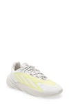 Adidas Originals Ozelia Sneaker In White/ Yellow