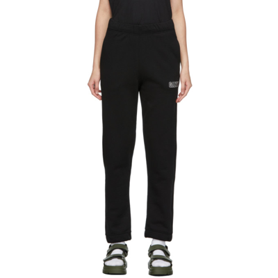 Ganni Embroidered Logo Track Trousers In Black