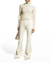 Nanushka Textured Long-sleeve Turtleneck Top In Creme