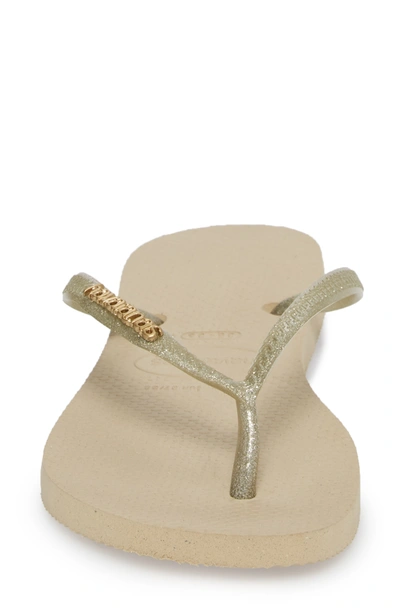 Havaianas 'slim Logo' Metallic Flip Flop In Sand Grey/lt Gold