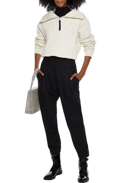 Iro Pepinea Pleated Wool-blend Flannel Tapered Trousers In Black