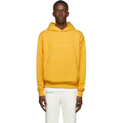 Adidas X Humanrace By Pharrell Williams Ssense Exclusive Humanrace Tonal Logo Hoodie In Bold Gold 005a