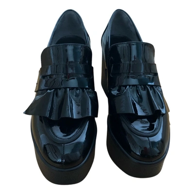 Pre-owned Robert Clergerie Patent Leather Flats In Black