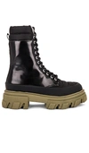 Ganni Lug Sole Leather Lace Up Tall Combat Boots In Black