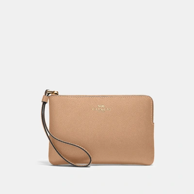 Coach Corner Zip Wristlet In Beige