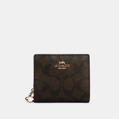 Coach Snap Wallet In Signature Canvas In Brown