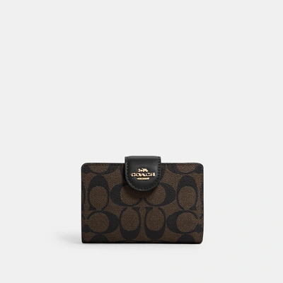 Coach Medium Corner Zip Wallet In Signature Canvas In Brown