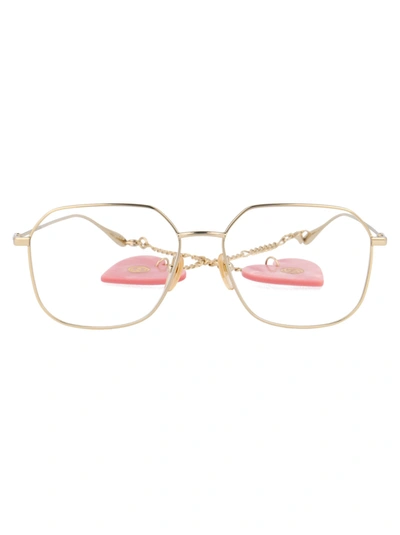 Gucci Gg1032o Eyewear In 004 Gold Gold Transparent