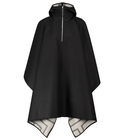 Totême Hooded Asymmetric Wool Poncho In Black