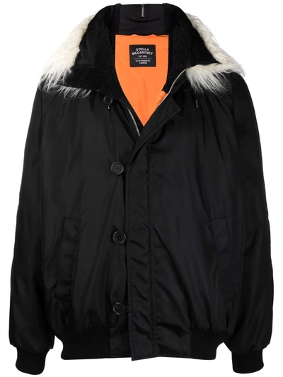 Stella Mccartney X Tom Tosseyn Unisex Shared 3 Aiden Hooded Bomber Jacket With Faux Fur Trim In Black