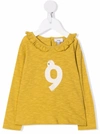 Knot White Dove Ruffled Blouse In Yellow