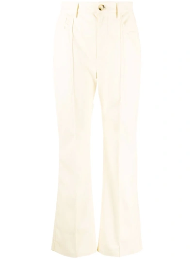 Nanushka Zoey Faux Leather Kick Flared Pants In Vanilla