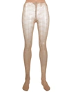 VETEMENTS LOGO-PRINT MESH TIGHTS