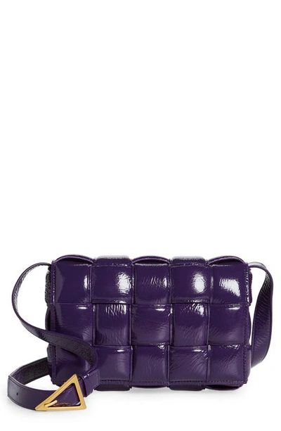 Bottega Veneta Padded Cassette Patent Leather Crossbody Bag In Raisin-gold