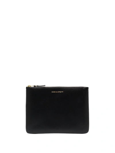 Comme Des Garçons Debossed Logo Zipped Wallet In Black