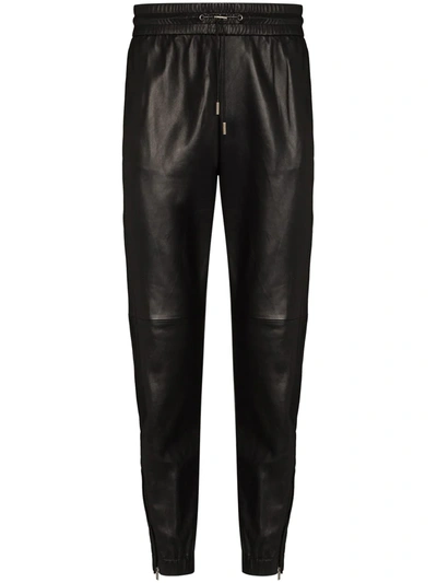 Saint Laurent Zipped Ankles Tapered Track Pants In Nero