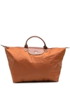 Longchamp Le Pliage Folding Travel Bag In Brown