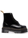 Dr. Martens Sinclair Combat Boot In Black Hammered Leather With A Large Treaded Sole In Black