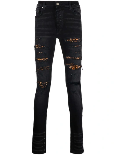 Amiri Leopard Print-panel Fitted Stretch-denim Jeans In Black