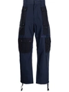 White Mountaineering Multi-pocket Cotton-blend Parachute Trousers In Blue