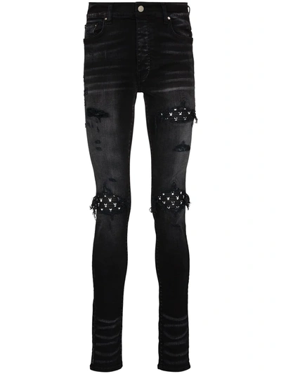 Amiri Mx1 Skinny-fit Panelled Distressed Jeans In Black