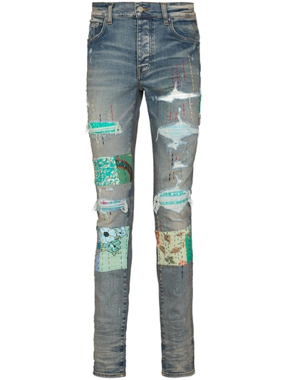 Amiri Quilted Patch-detail Slim-fit Jeans In Clay Indigo