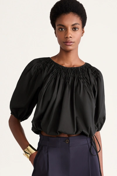Merlette Lotus Smocked Cotton-chambray Blouse In Black