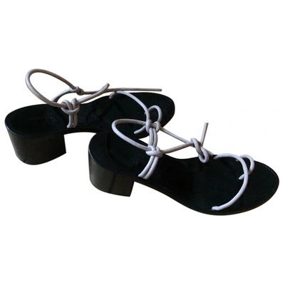 Pre-owned Loq Leather Sandal In Black