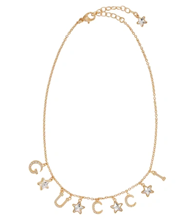 Gucci Script-logo Crystal Star Necklace In Gold,kristall