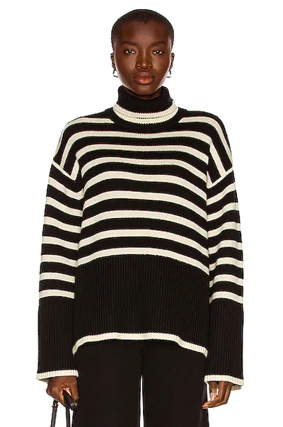 Totême Signature Striped Turtleneck Sweater In Black,white