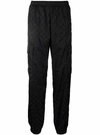 MISBHV BLACK MONOGRAM-PRINT TROUSERS,DDE4C084-50FF-E1E6-23FF-38BA85D120A5