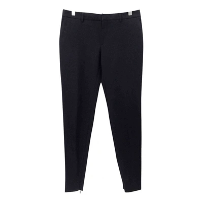 Pre-owned Saint Laurent Wool Slim Pants In Black