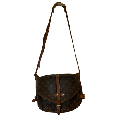 Pre-owned Louis Vuitton Saumur Cloth Crossbody Bag In Brown