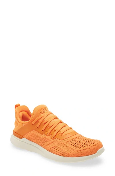Apl Athletic Propulsion Labs Techloom Tracer Logo-debossed Stretch-knit Mid-top Trainers In Orange Pristine