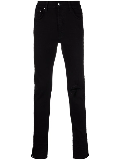 Amiri Ripped-detail Jeans In Black