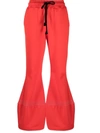 JW ANDERSON RED FLARED SPORTS TROUSERS