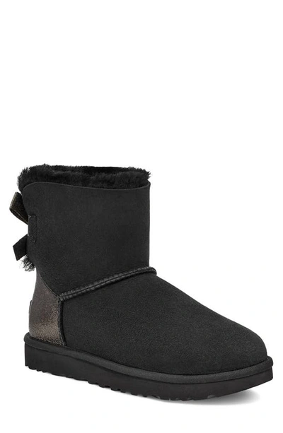 Ugg (r) Mini Bailey Bow Ii Genuine Shearling Bootie In Black