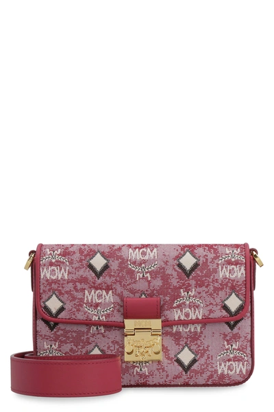 Mcm Monogram Detail Canvas Clutch In Red